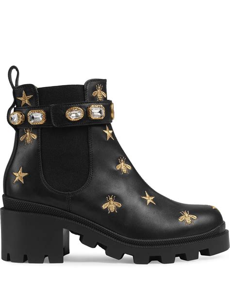 embroidered leather ankle boot with belt replica|Women's ankle boot with Web in black shiny leather .